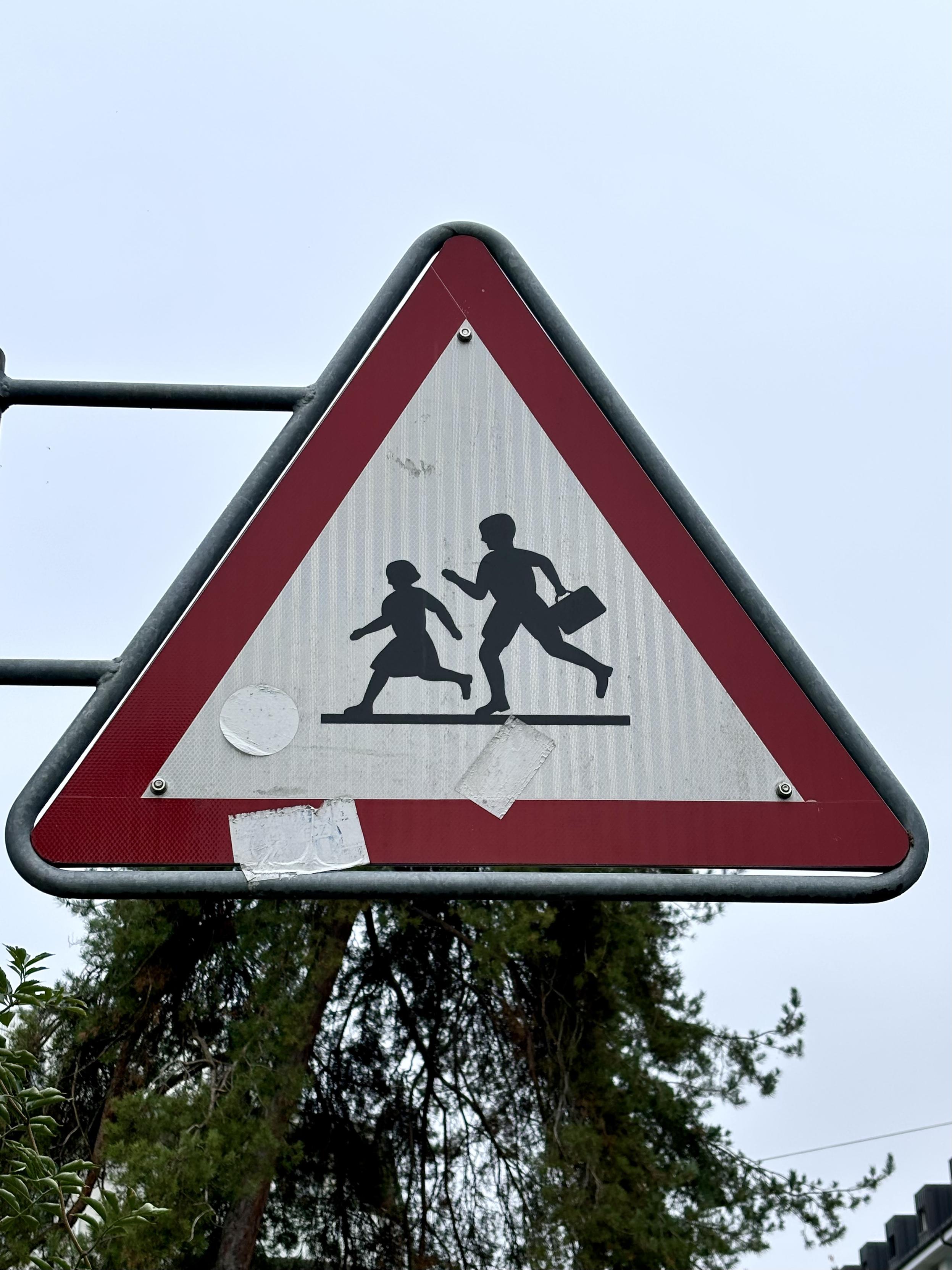 A photo of a Swiss road sign: Children