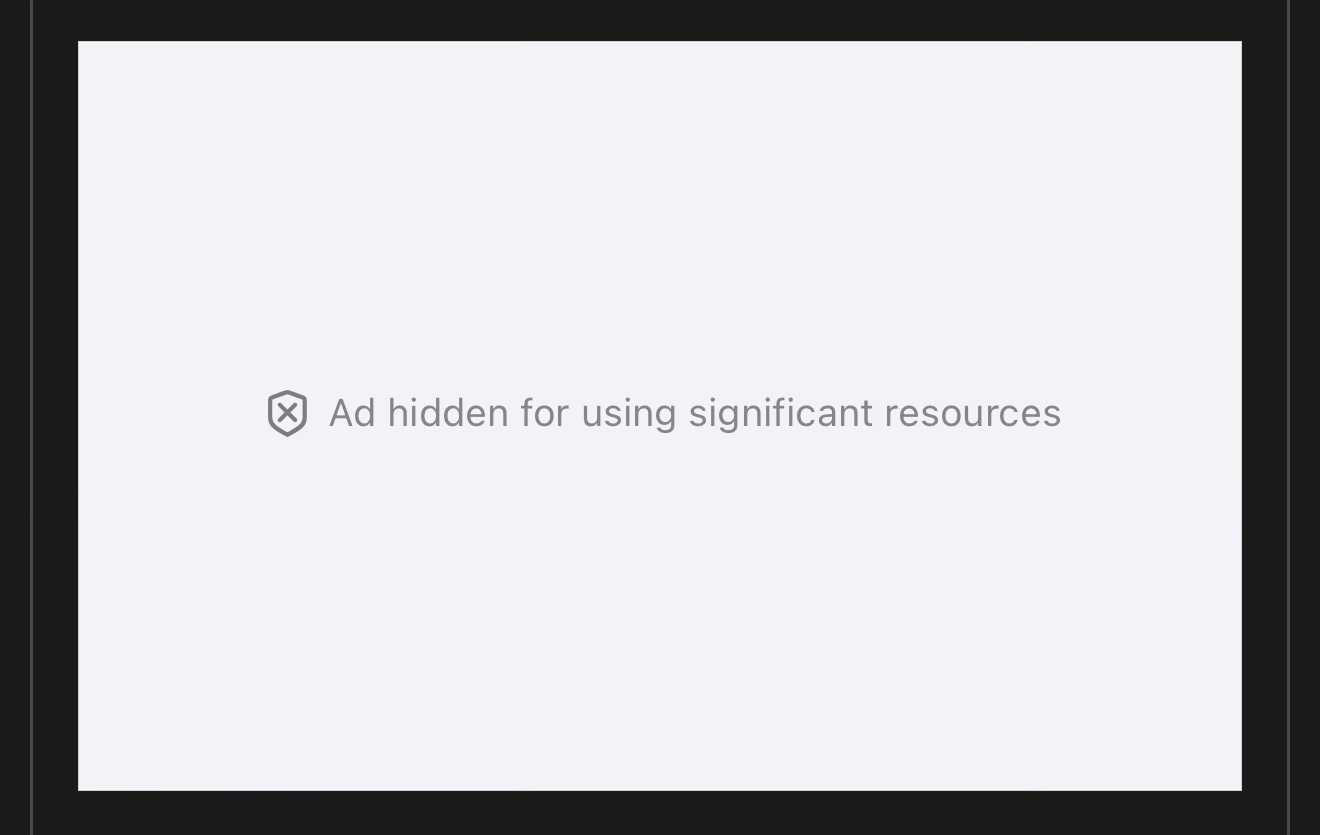 A cropped screenshot of Safari on iOS 26 showing an advertising frame that is white with grey text that reads: Ad hidden for using significant resources